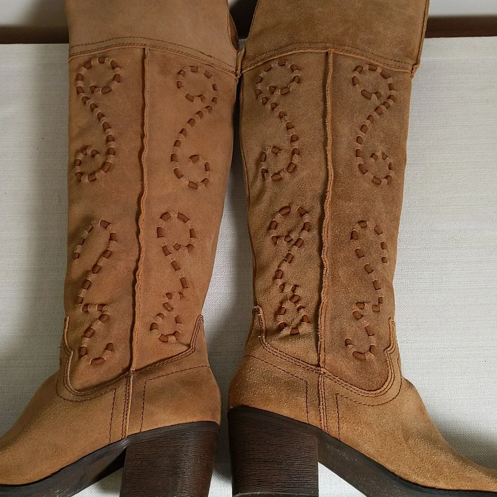 Carlos Santana stylish tan